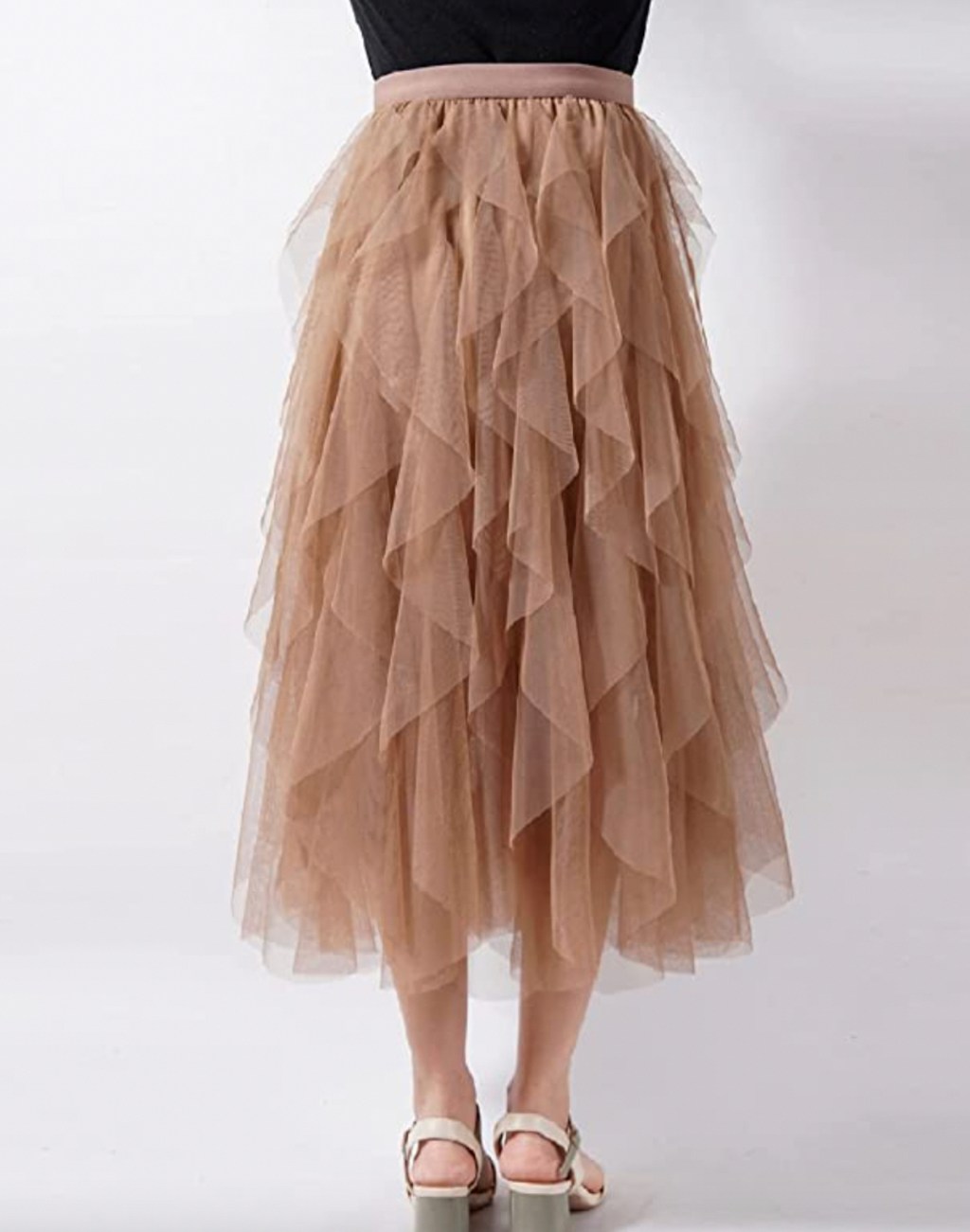 woman wearing blush pink tulle skirt anthropologie clothes