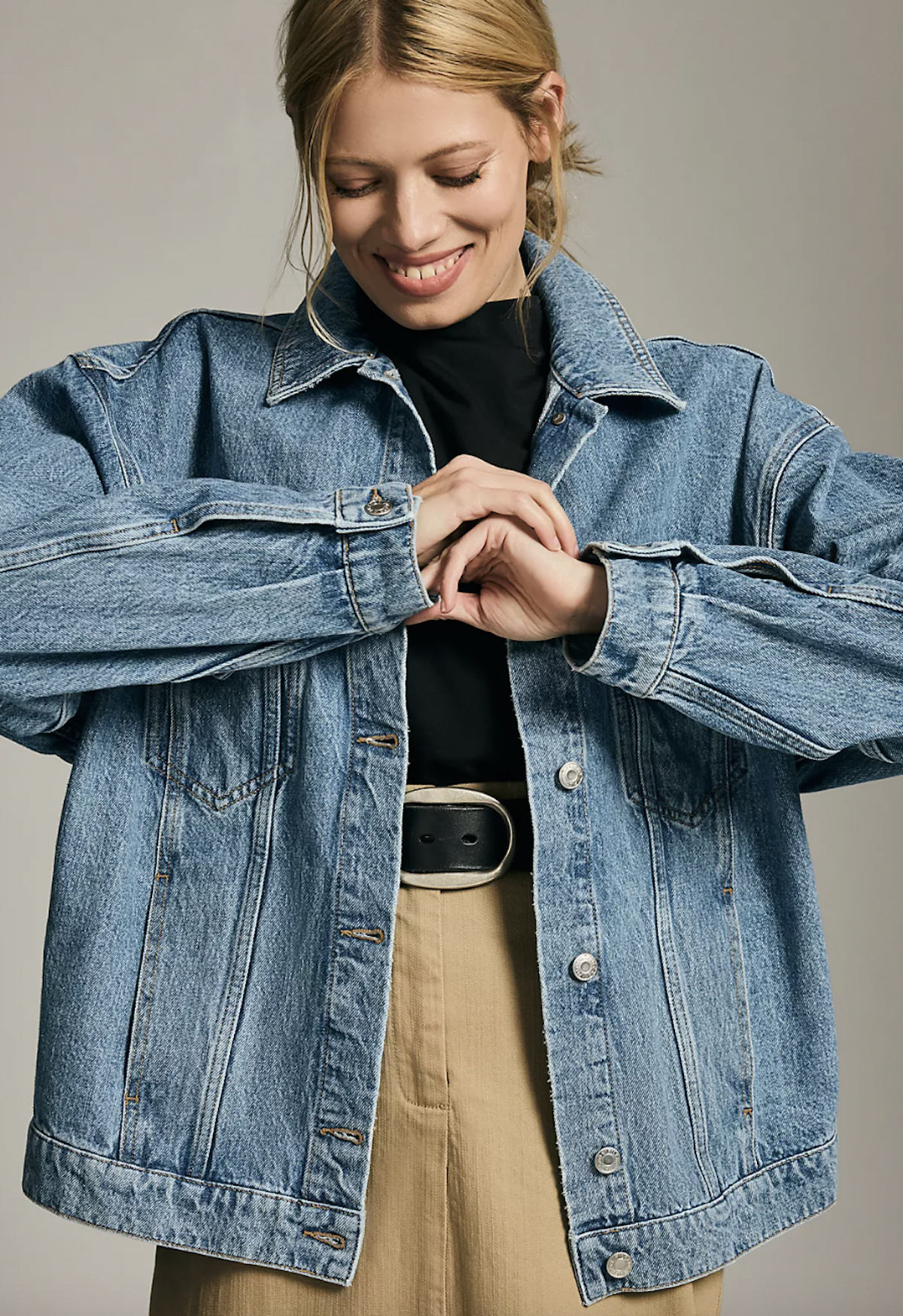 woman posing in denim jean jacket
