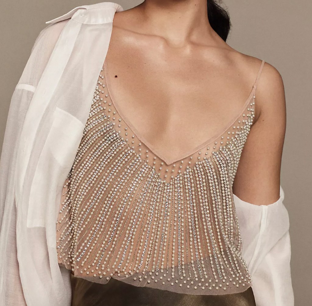 close up of woman posing in sequin pearl see through cami anthropologie clothes