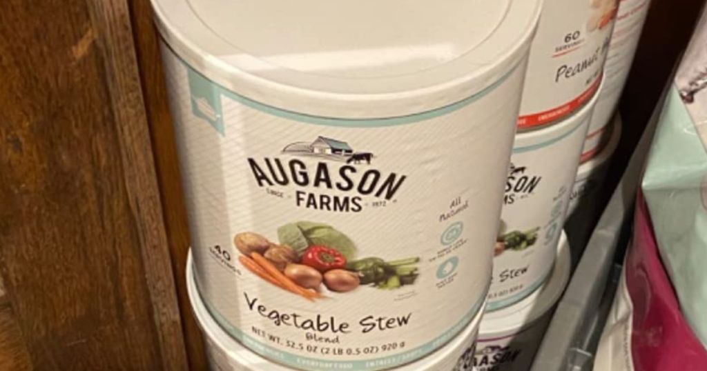 #10 cans of Augason Farms Vegetable Stew in cabinet