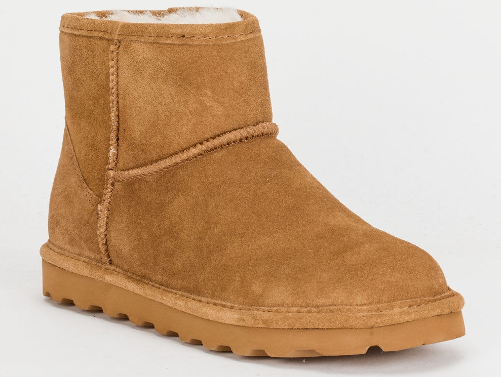Women's tan bootie with white fur lining.