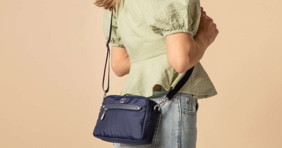 woman wearing a baggallini crossbody bag