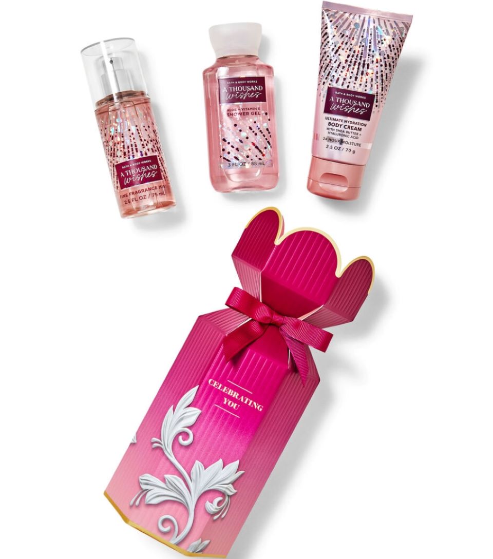 Bath & Body Works gift set with a box, spray, body wash, and a lotion
