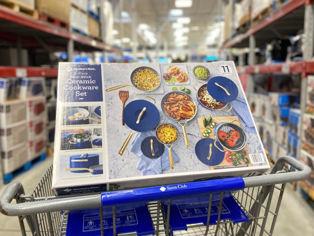 Blue ceramic cookware set displayed in sams club cart at the store