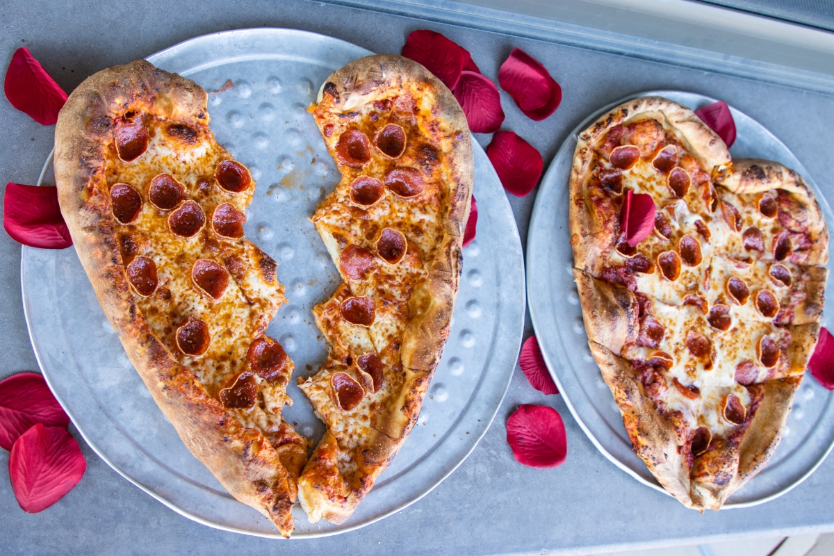 Old Chicago restaurant Valentine's Day special of two heart-shaped pizzas with one cut in half