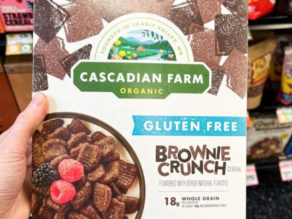 hand holding Cascadian Farms Organic Cereal 