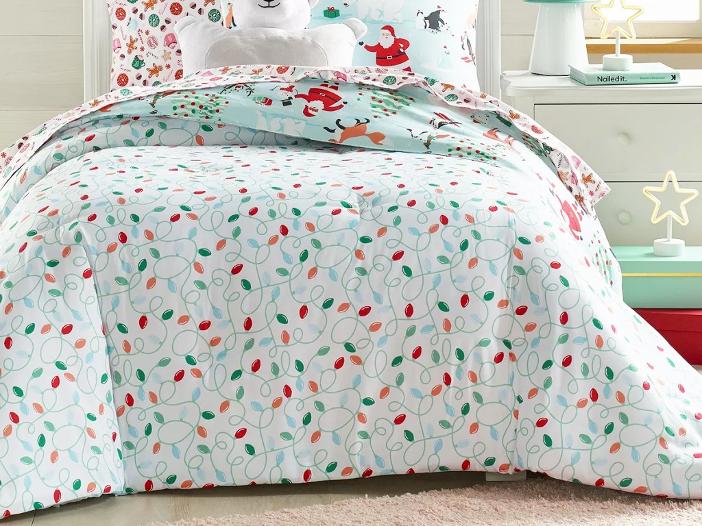 white comforter with christmas light print