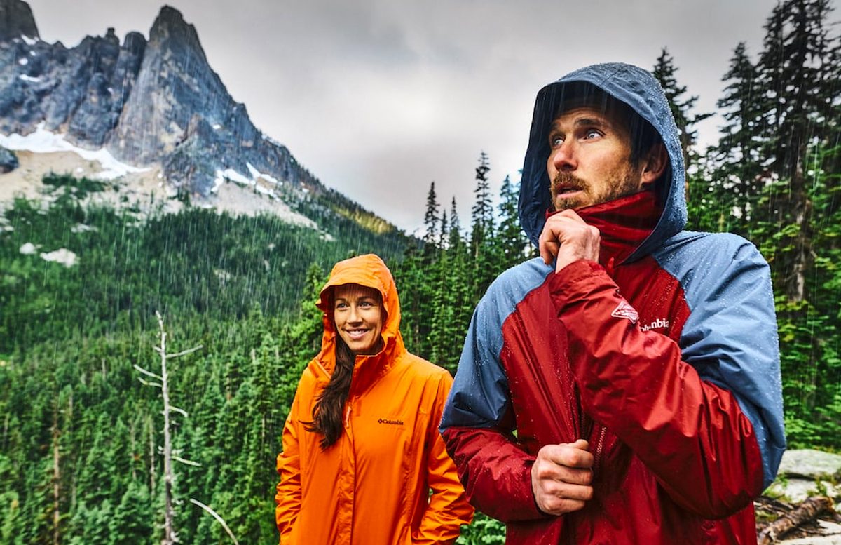 Columbia Clothing being worn on a hike in the mountains by a man and woman