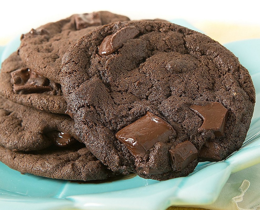 Chocolate cookies with chocolate chips on a plate