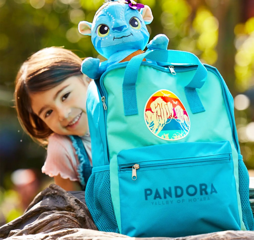girl with blue disney backpack
