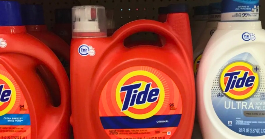 large containers of Tide Liquid Laundry Detergent on a store shelf