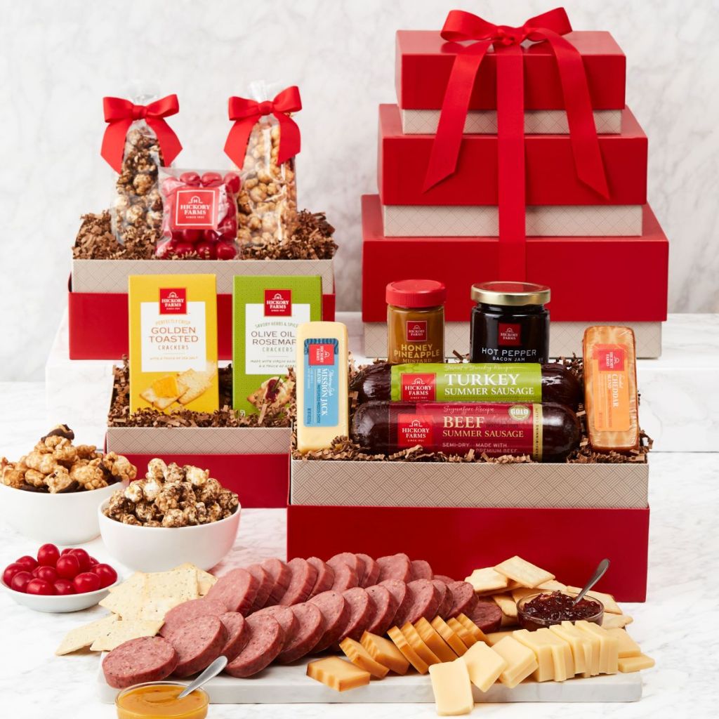 Hickory Farms gift boxes with summer sausage, crackers, cheese, and candy around the boxes