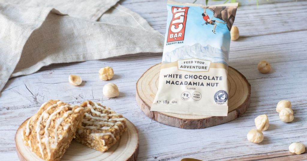 Cliff Bars White Chocolate Macadamia Nut shown in package and on table