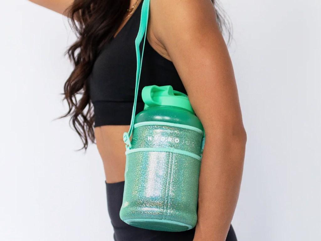 woman with green hydrojug in green sleeve