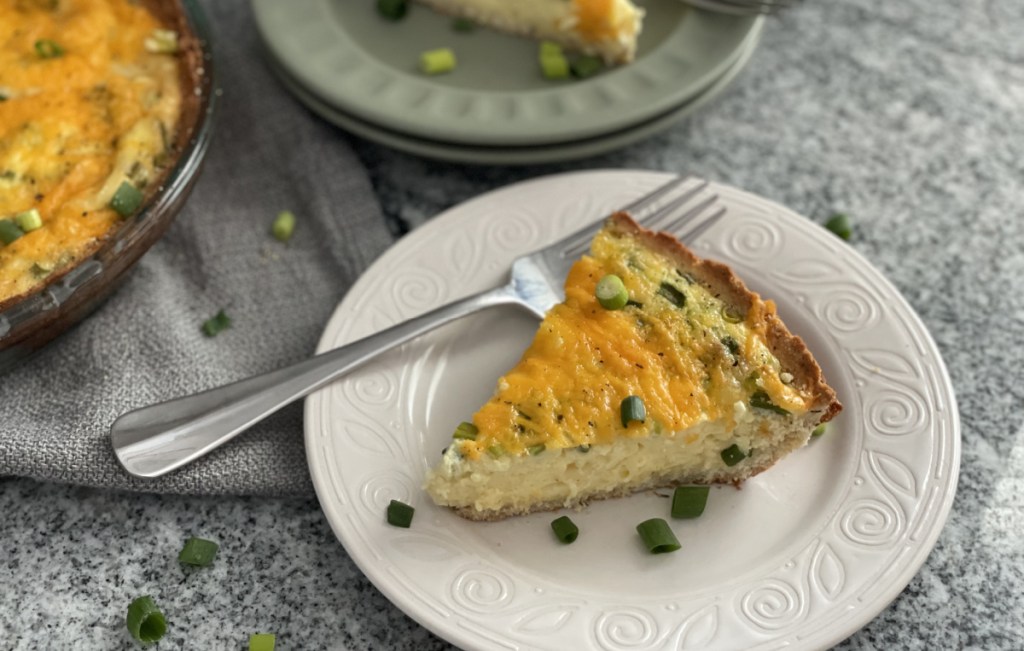a slice of keto vegetarian quiche which can be made into many meatless meals