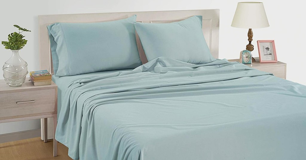 blue sheets on a bed