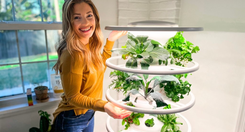woman with Lettuce Grow Farmstand