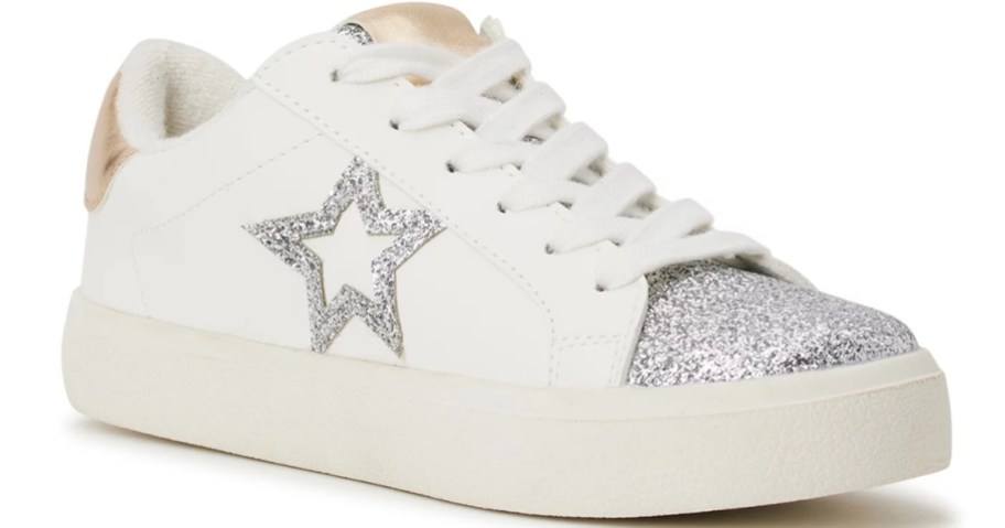 white women's sneaker with silver glitter toe and silver star on the side