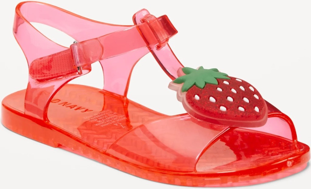 Red jelly sandal with a strawberry charm on the top