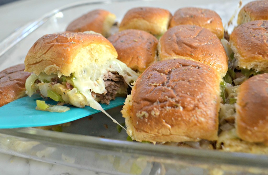 A platter of philly cheesesteak sliders which is one of the best gameday party foods
