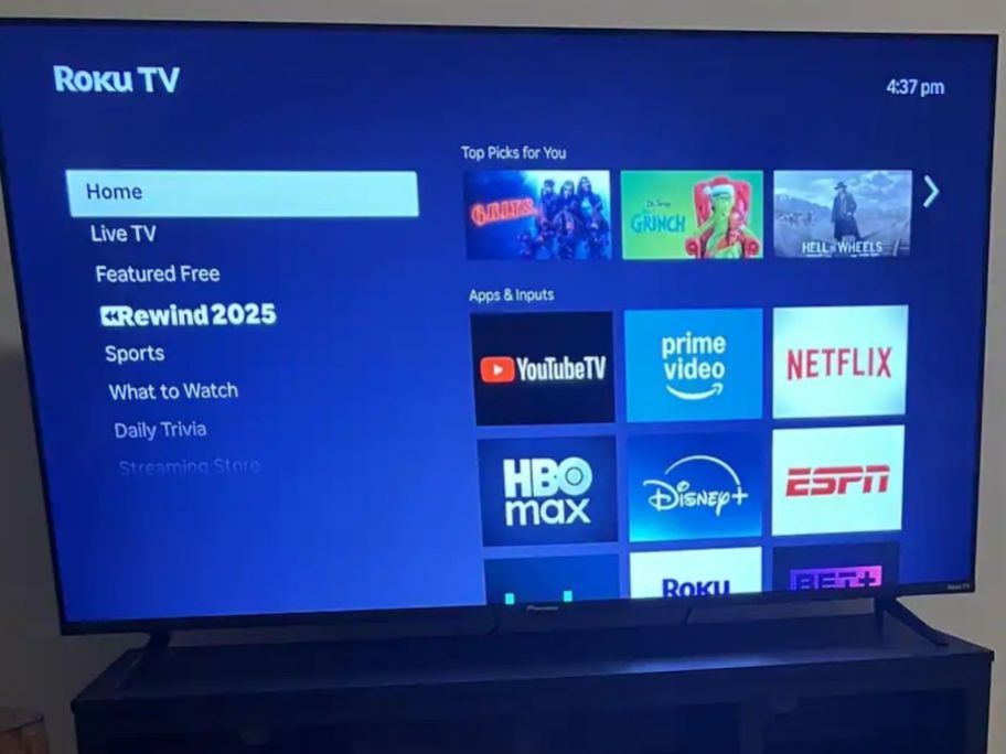 Pioneer tv displayed on top of a TV stand