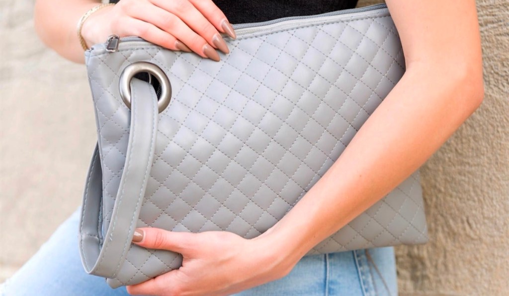 jane oversized quilted wristlet clutch bag