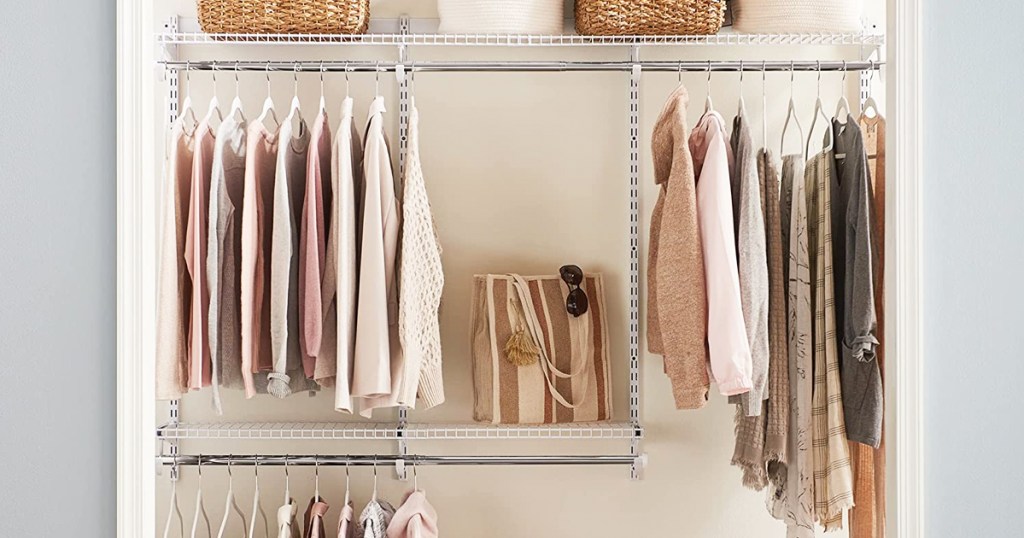 clothing in closet hanging from closet organizer