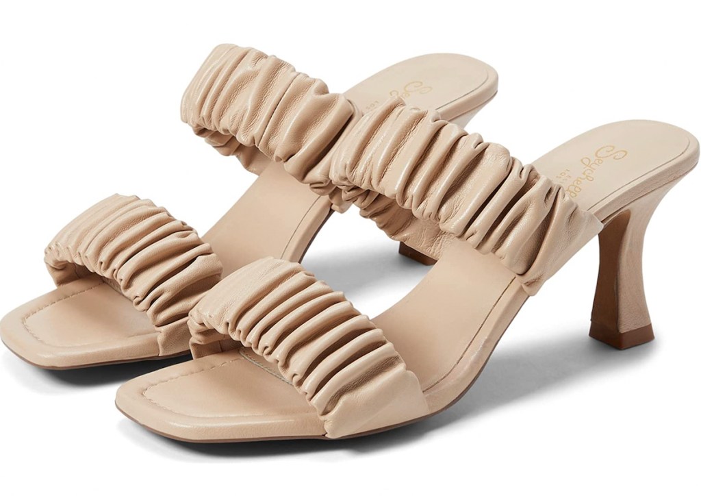 anthropologie clothes ruffled beige mule sandals stock photo with white background