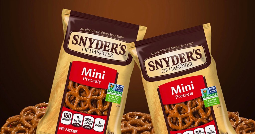 two packs of Snyder's Mini Pretzels surrounded by pretzels