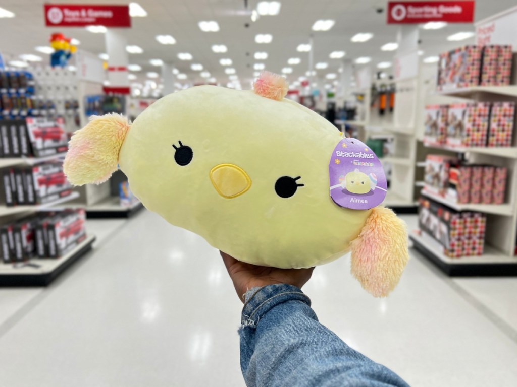 Squishmallows 11 Aimee the Chick Stackable Plush  in woman's hand at target