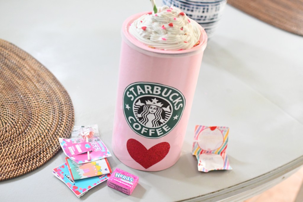 DIY Valentine Gift where you turn an oatmeal can into a starbucks drink lookalike.