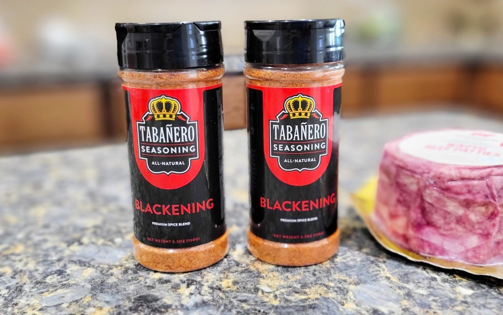 two bottles of Tabañero Blackening Seasoning on kitchen counter