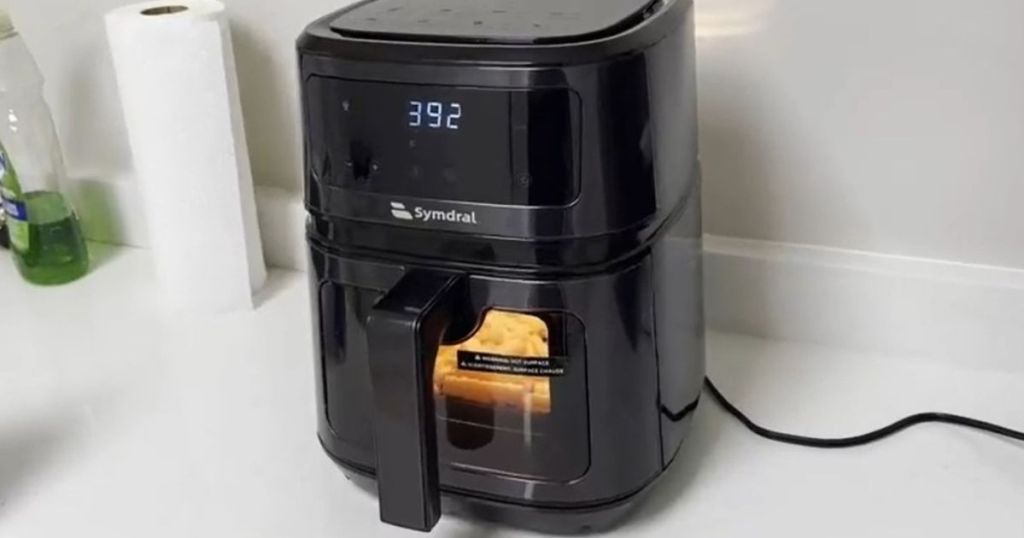 Taotronics Air Fryer w Clear Viewing Window illuminated showing fries inside