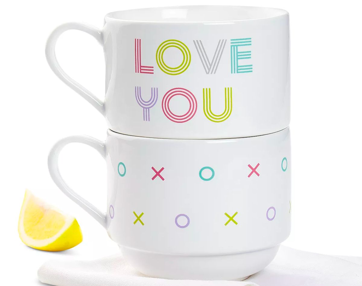 a 2-Piece set of Stackable Stoneware Mug with XO's and Love you printed on them in pastel colors