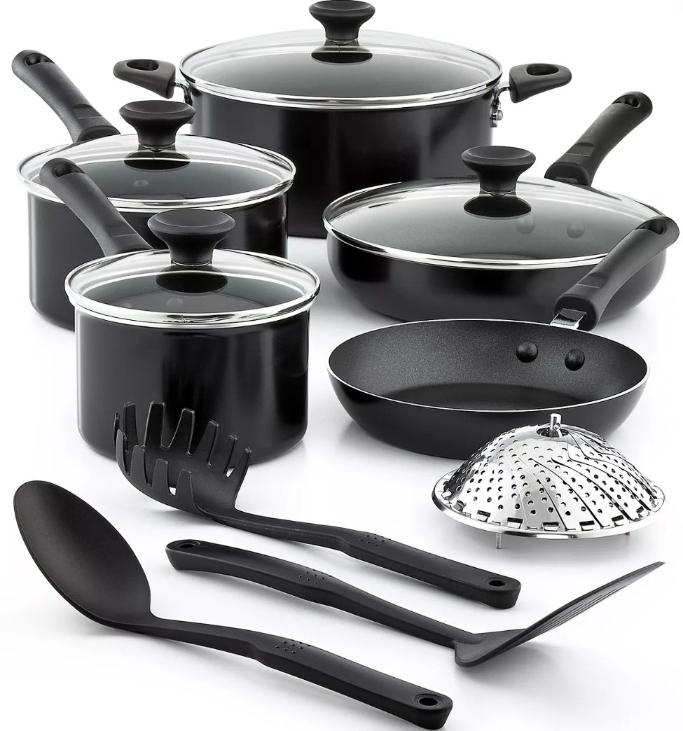 Two pans with lids, three pots with lids, two spoons and a spatula