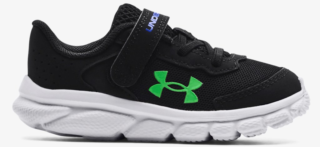 black and green under armour running shoe