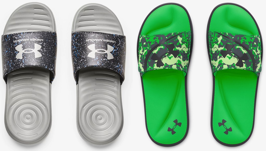 two pairs of under armour boys slides