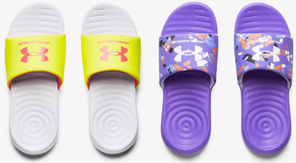 two pairs of under armour girls slides