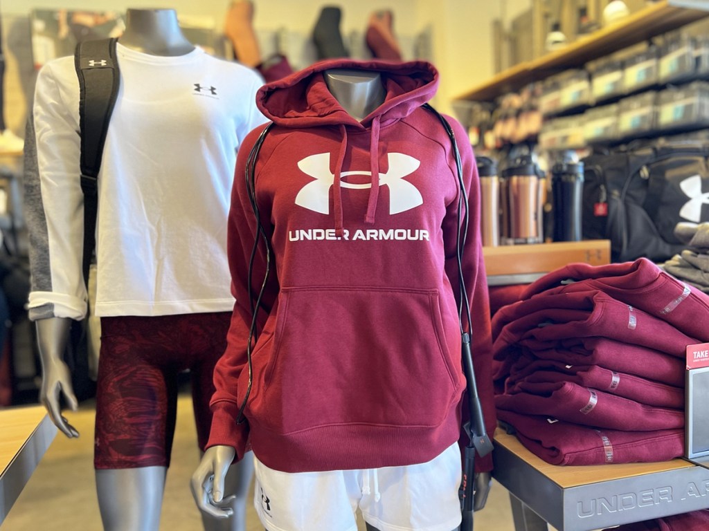 mannequin wearing red under armour hoodie