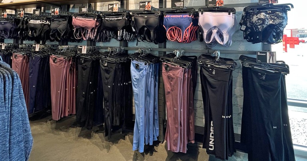 display wall of under armour leggings and sports bras