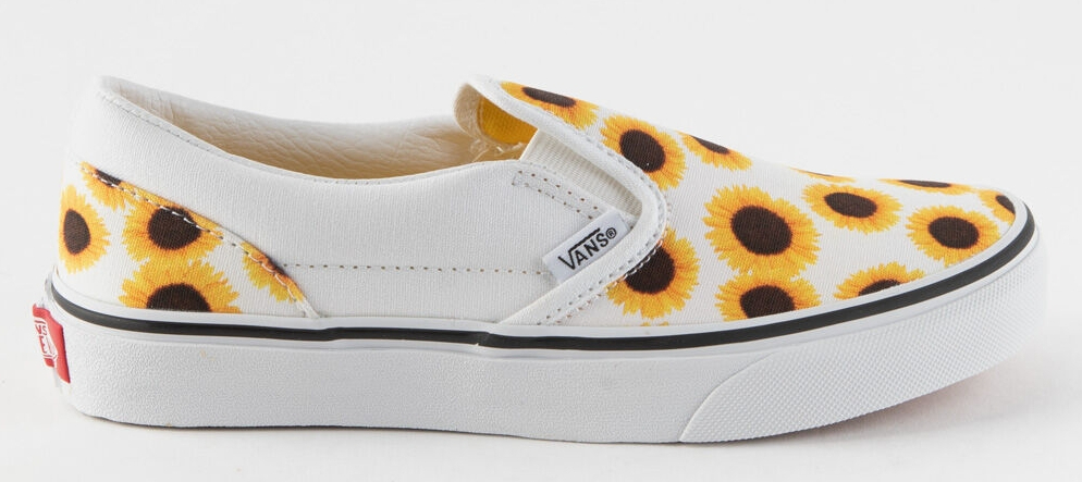 VANS shoe with sunflowers all over it and a white background.