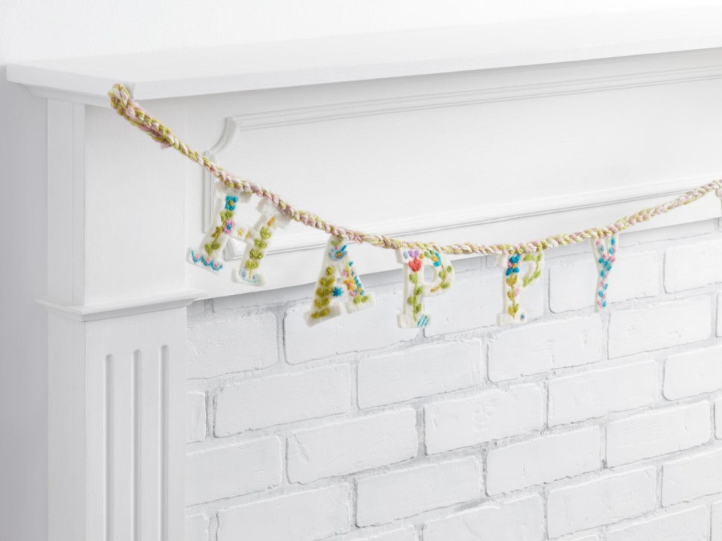 Felted Easter Garland hanging across a mantel