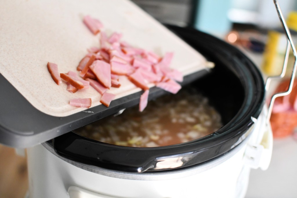 adding ham to slow cooker