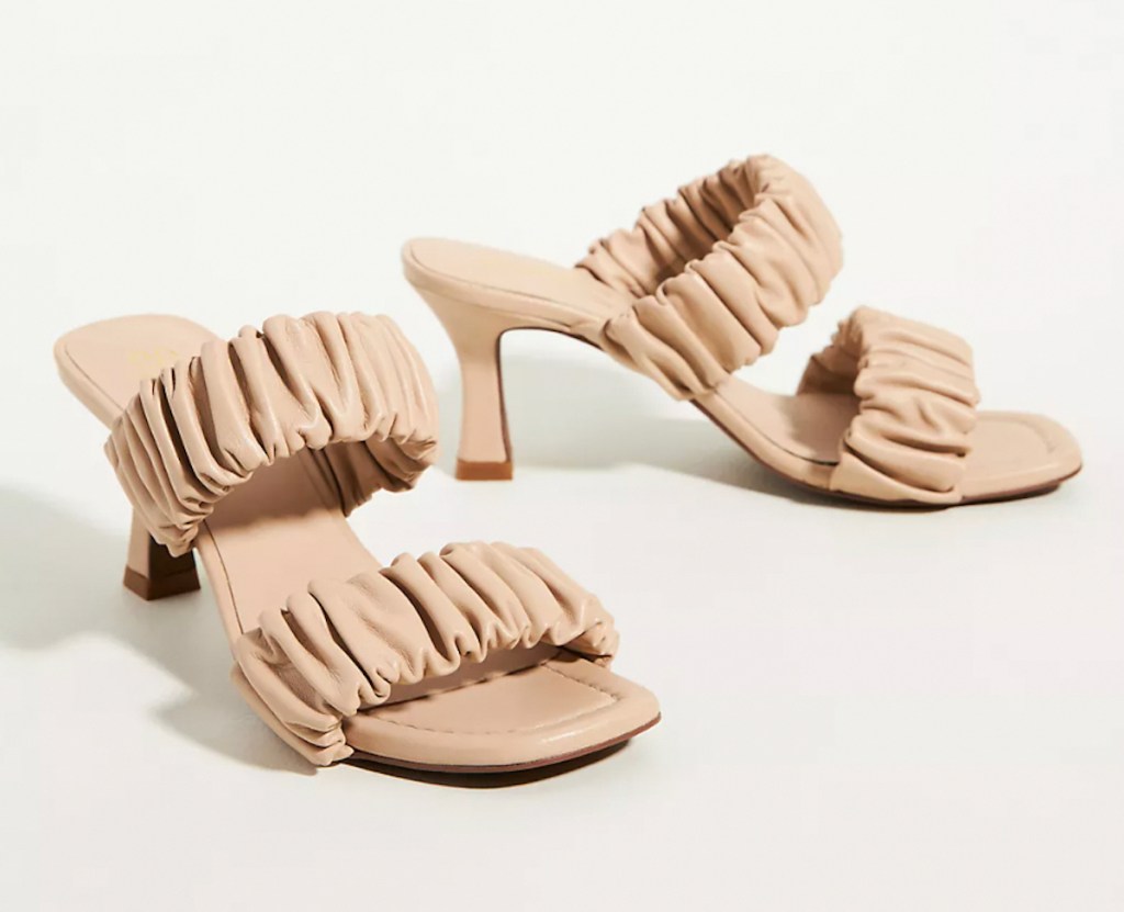 ruffled beige mule sandals stock photo with white background