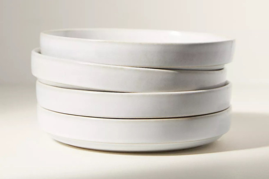 stack of deep dish white pasta bowls