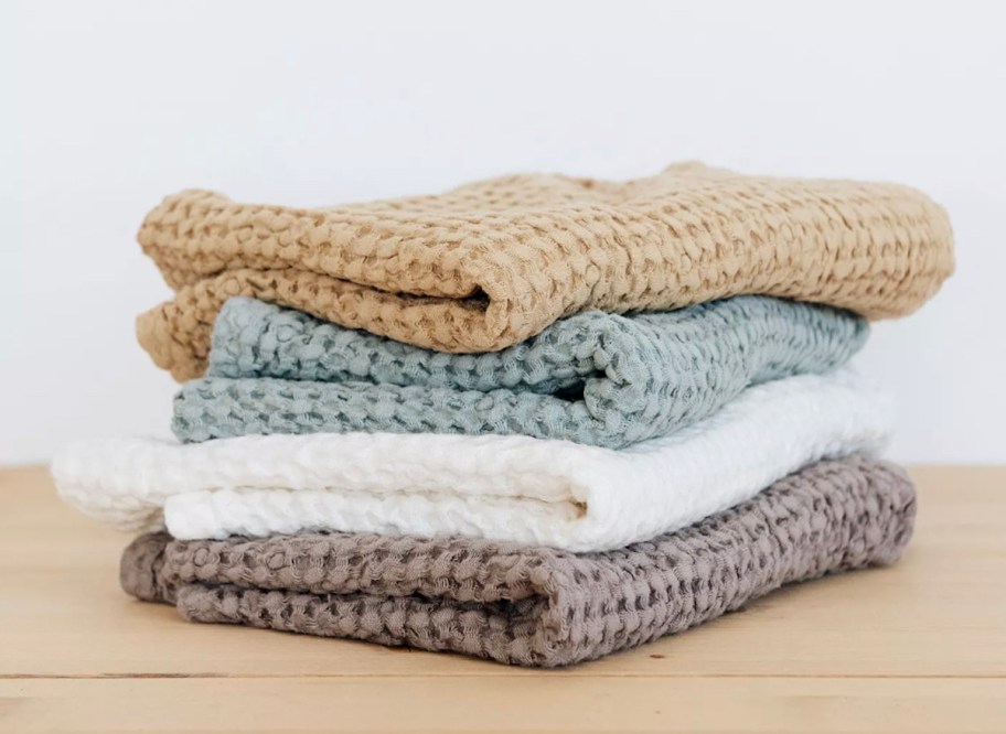 stack of waffle hand towels on countertop