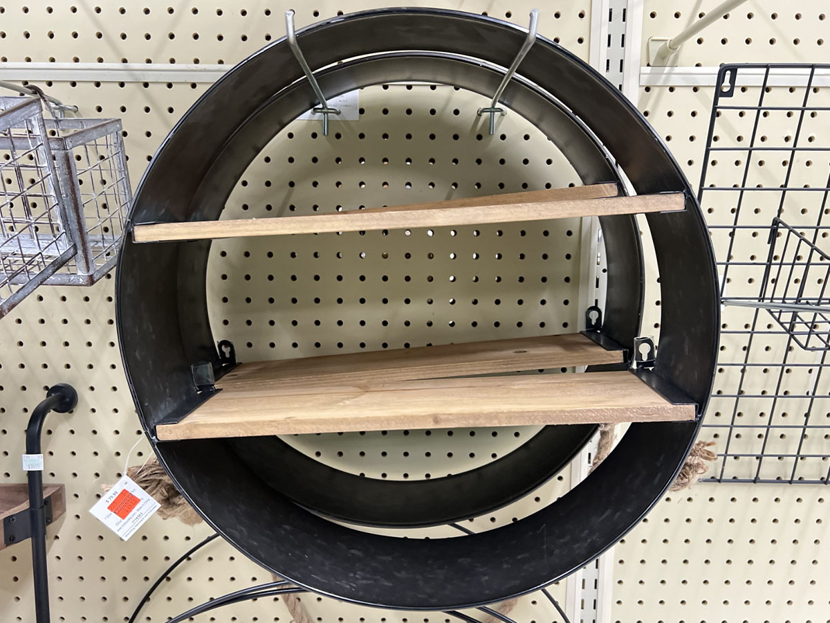 black and wooden circle shelf