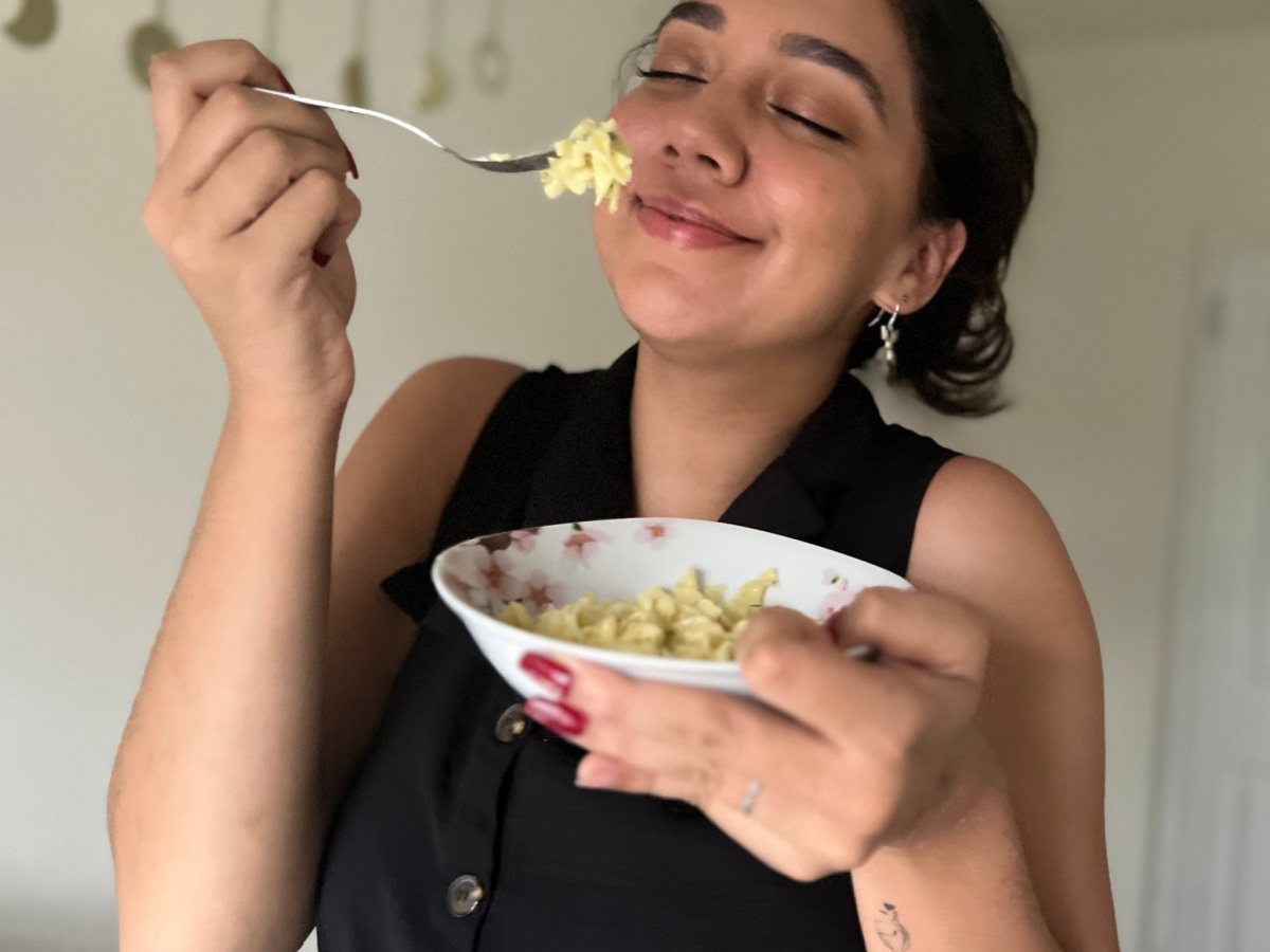 woman eating protein pasta