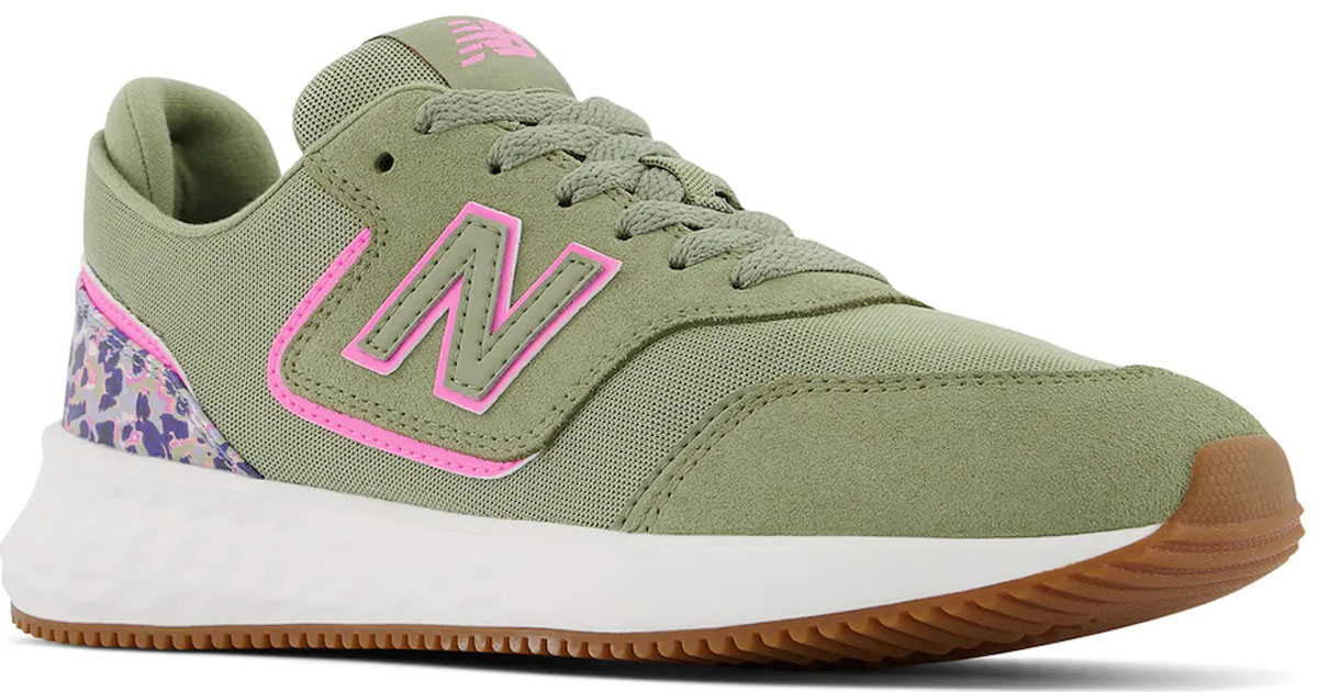 green and pink new balance sneakers stock image