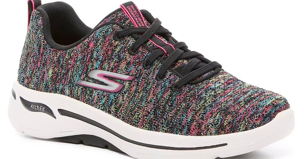 sketchers pink, black and gray sneakers stock image